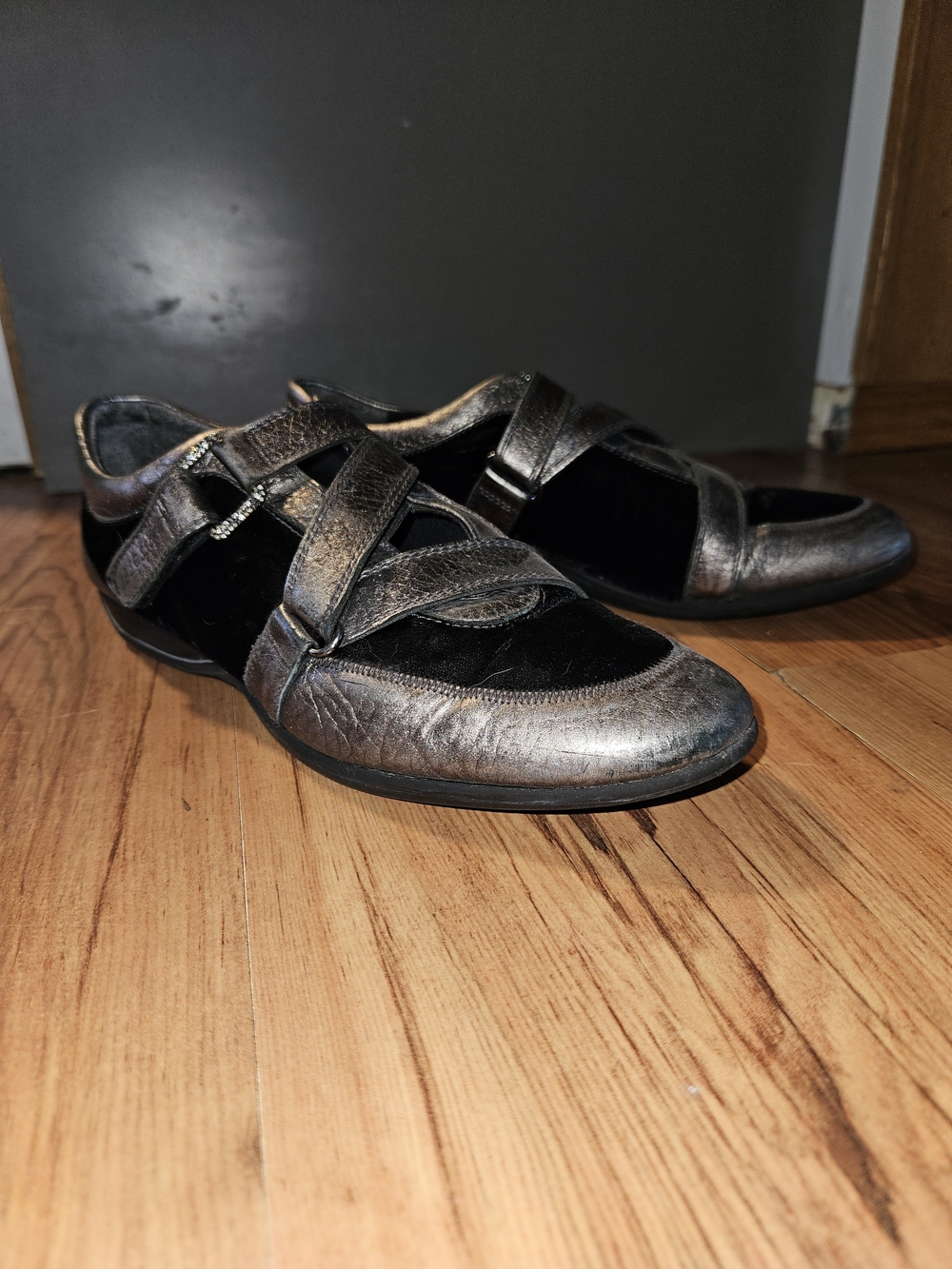 Stuart Weitzman Metallic Silver and Black Crisscross Strap Flats